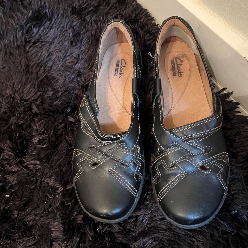 Clarks dark brown leather flats. 7.5